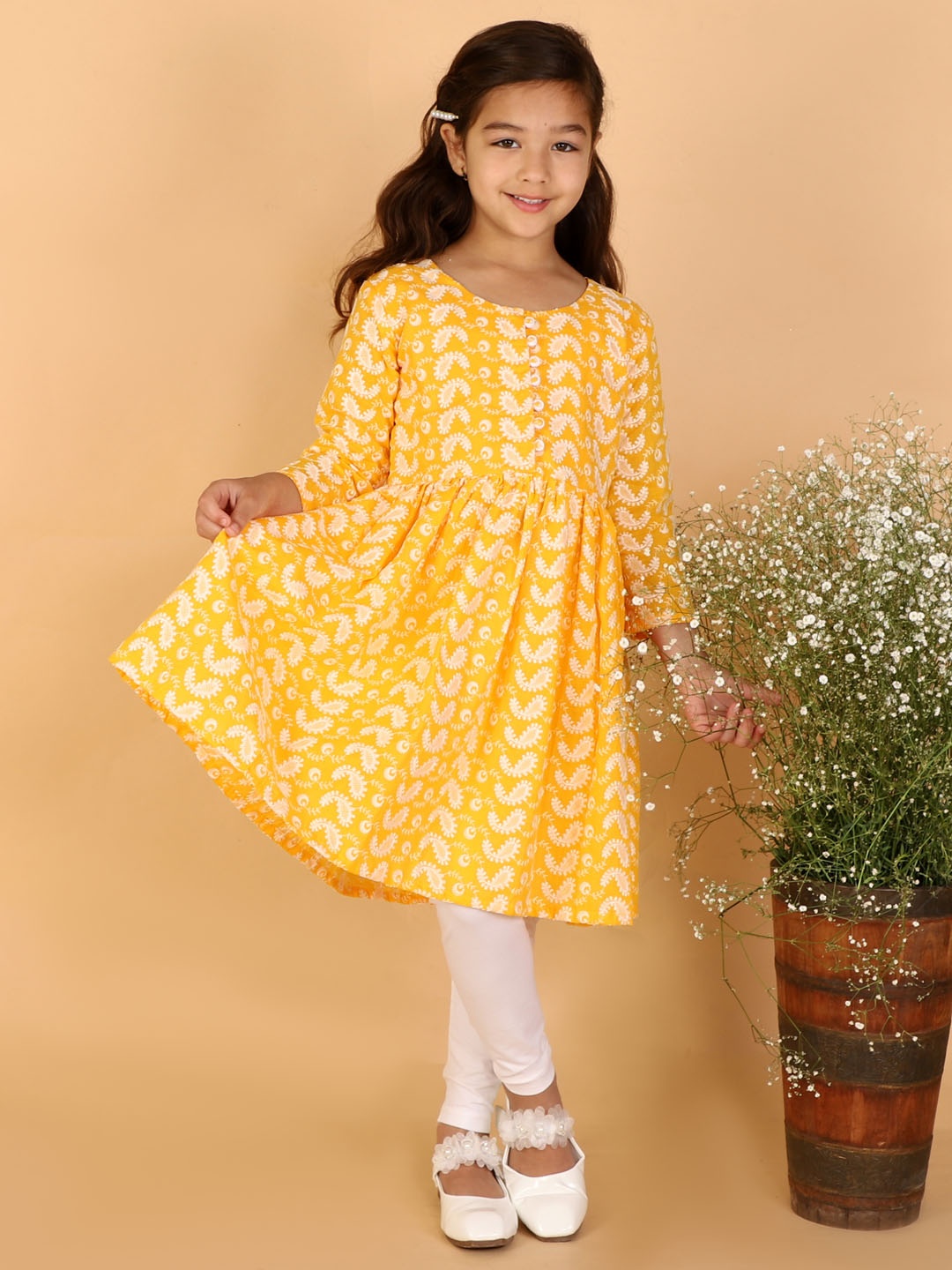 

VASTRAMAY Girls Yellow Printed Pleated Chikankari Pure Cotton Kurta