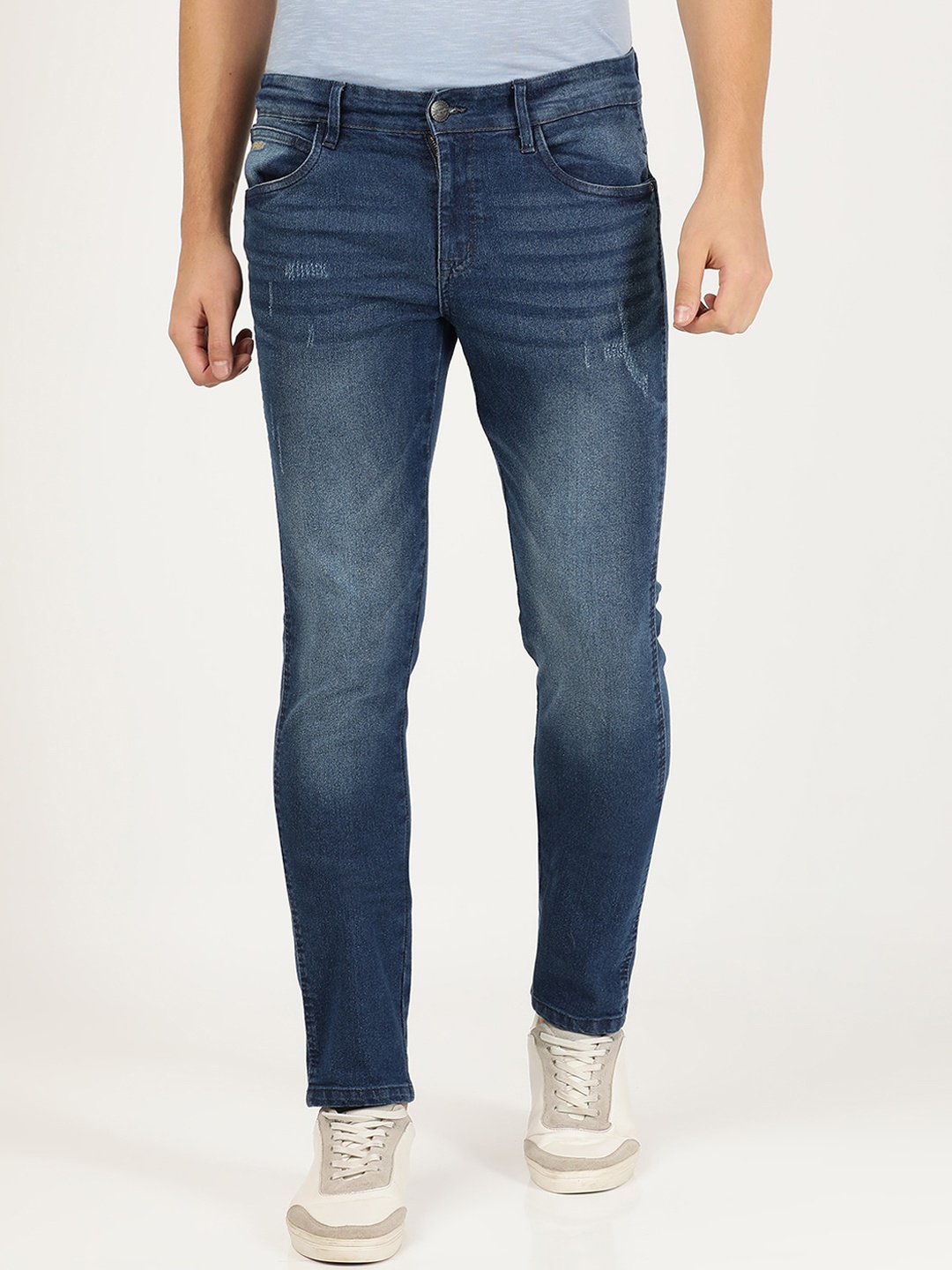 

Wrangler Men Blue Skanders Slim Fit Low-Rise Low Distress Heavy Fade Stretchable Jeans