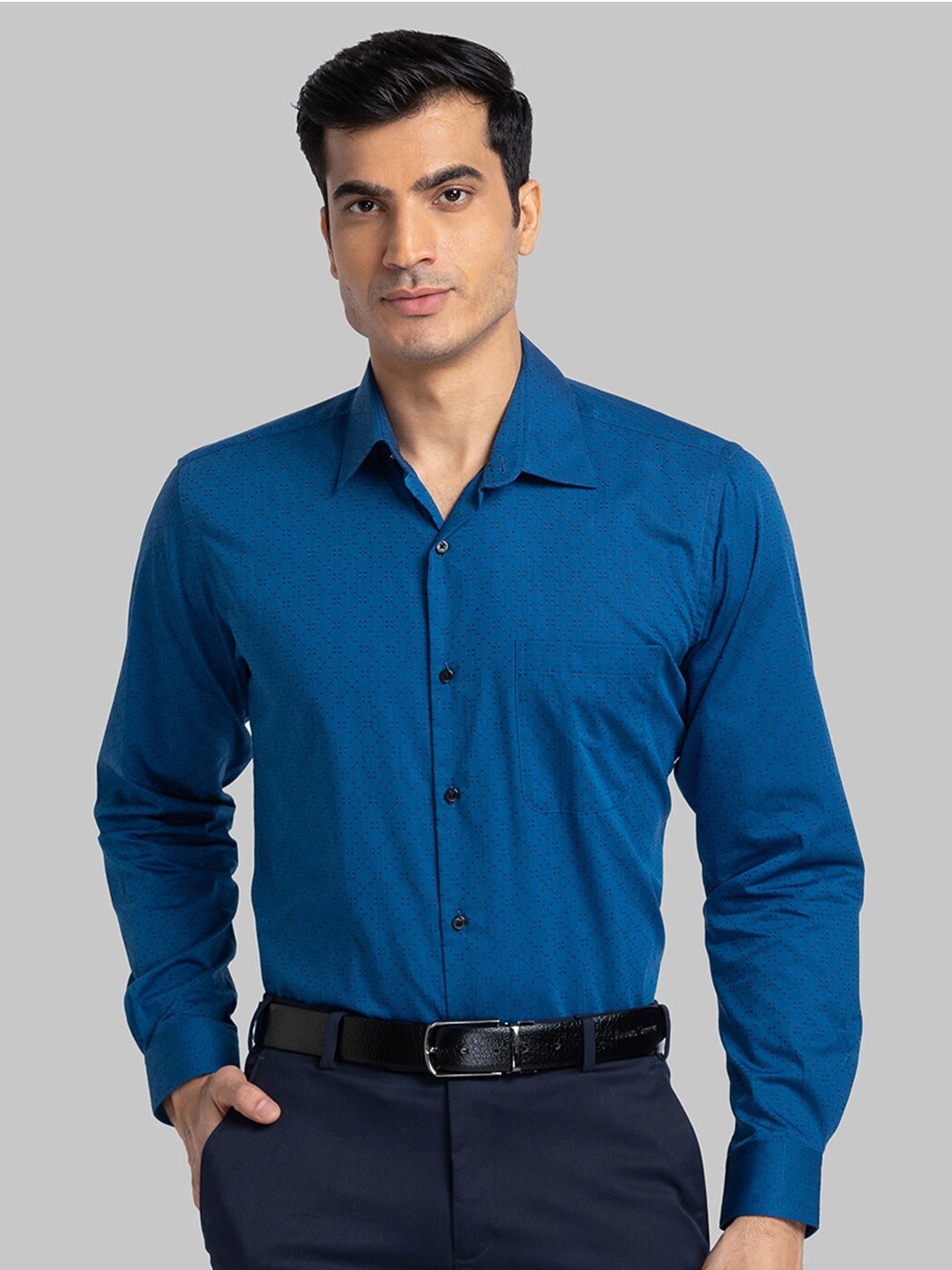 

Raymond Men Blue Solid Casual Shirt