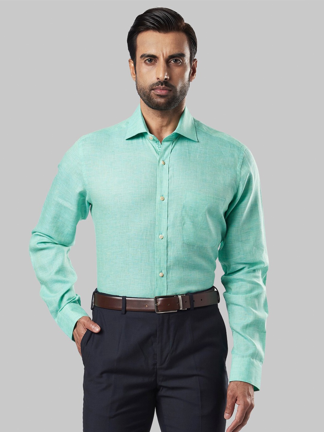 

Raymond Men Sea Green Regular Fit Solid Formal Shirt