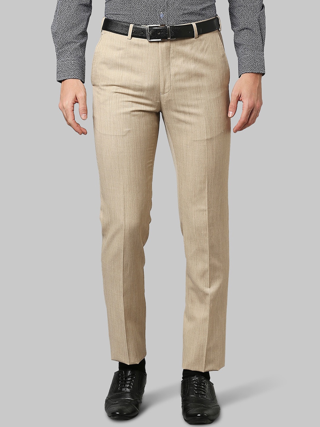 

Raymond Men Beige Solid Formal Trousers