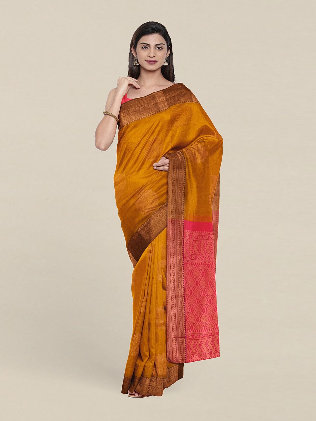 

Pothys Mustard & Pink Woven Design Zari Silk Cotton Saree