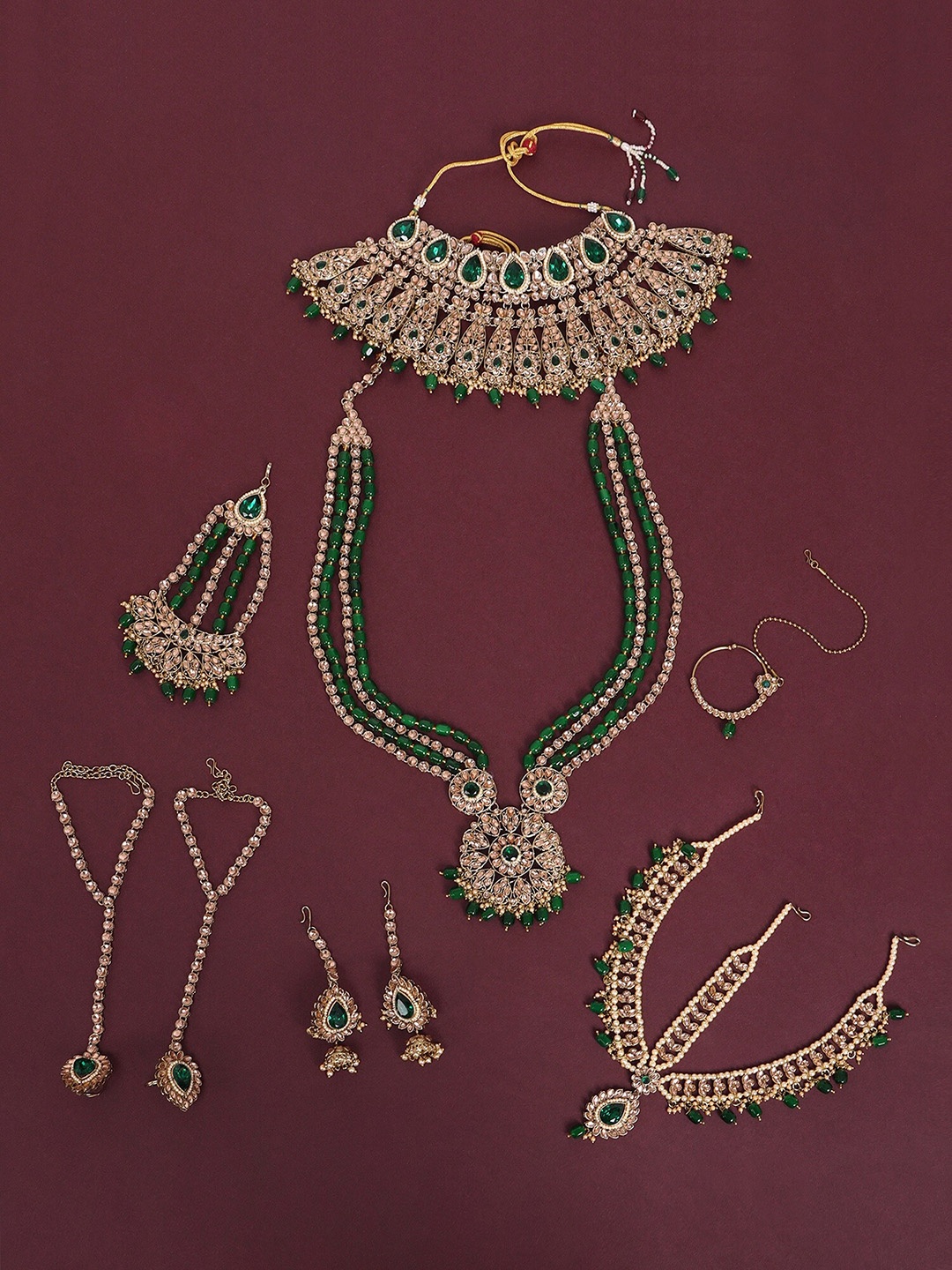 

JEWELS GEHNA Gold-Plated Gold-Toned Green Stone Studded Jewellery Set