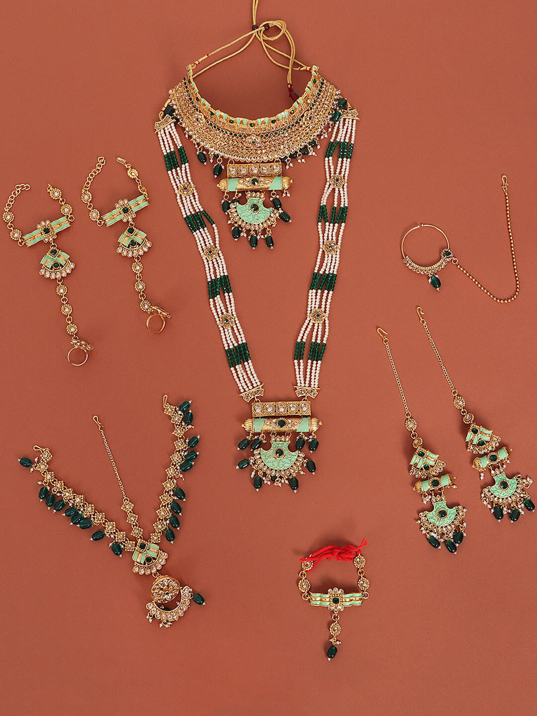 

JEWELS GEHNA Gold-Plated Green & White Stone Studded & Beaded Bridal Vilandi Jewellery Set