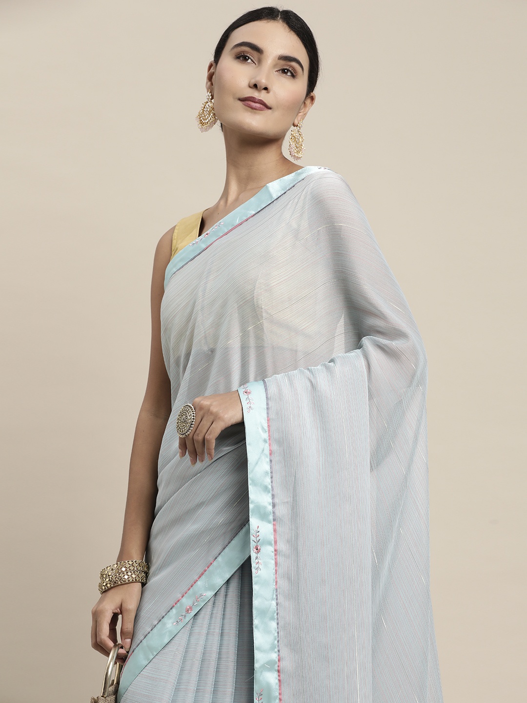 

Pothys Blue Striped Zari Pure Chiffon Saree