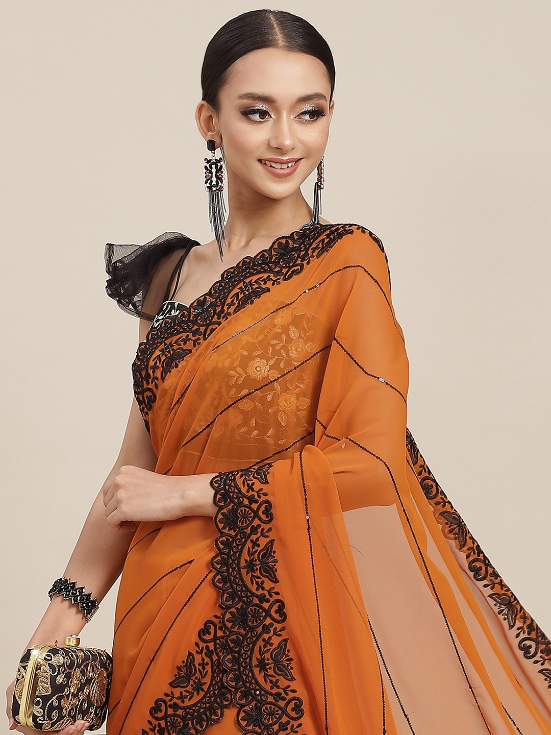 

Chhabra 555 Rust Orange Striped Sequinned Saree