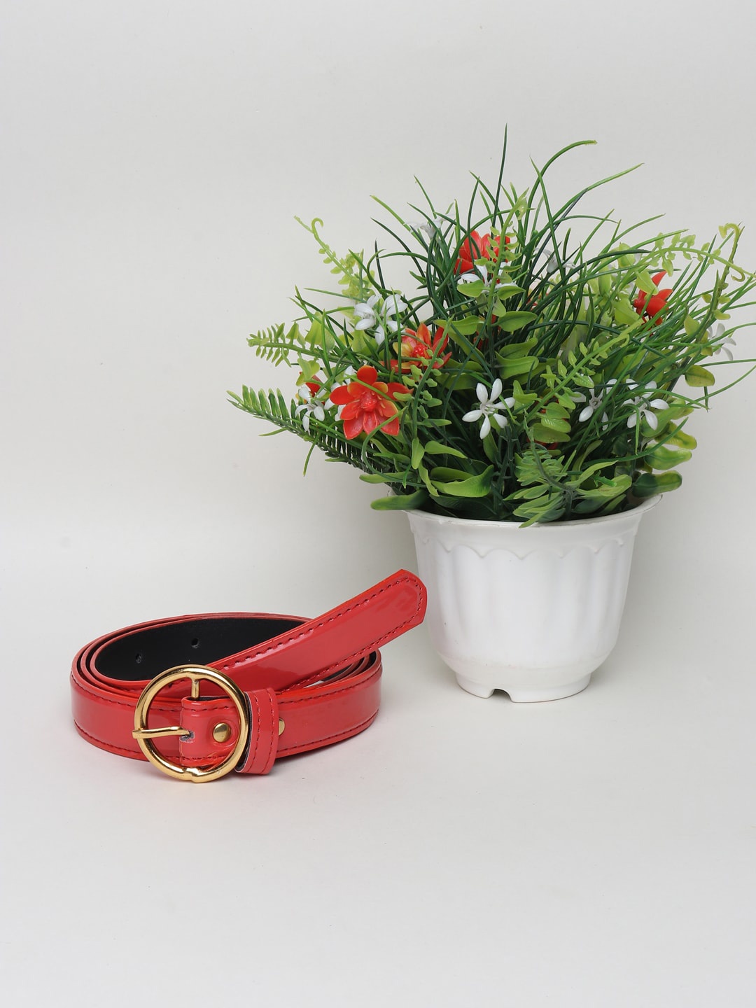 

Swiss Design Women Red Solid Slim Width Belts