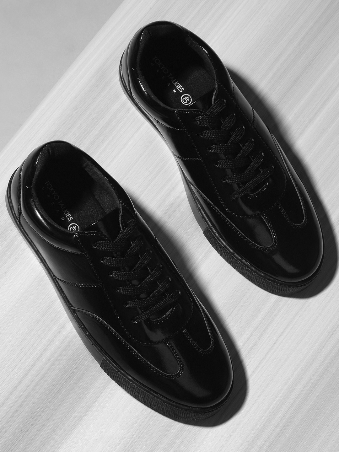 

Tokyo Talkies Women Black Textured PU Sneakers