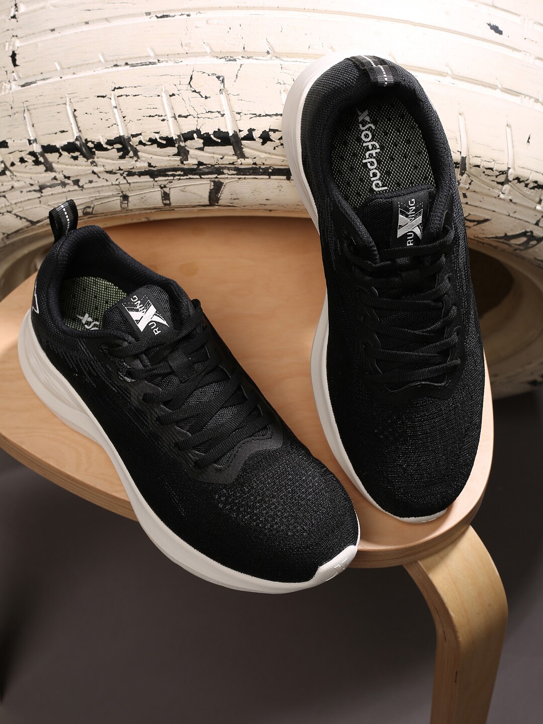 

Xtep Women Black Textile Running Shoes