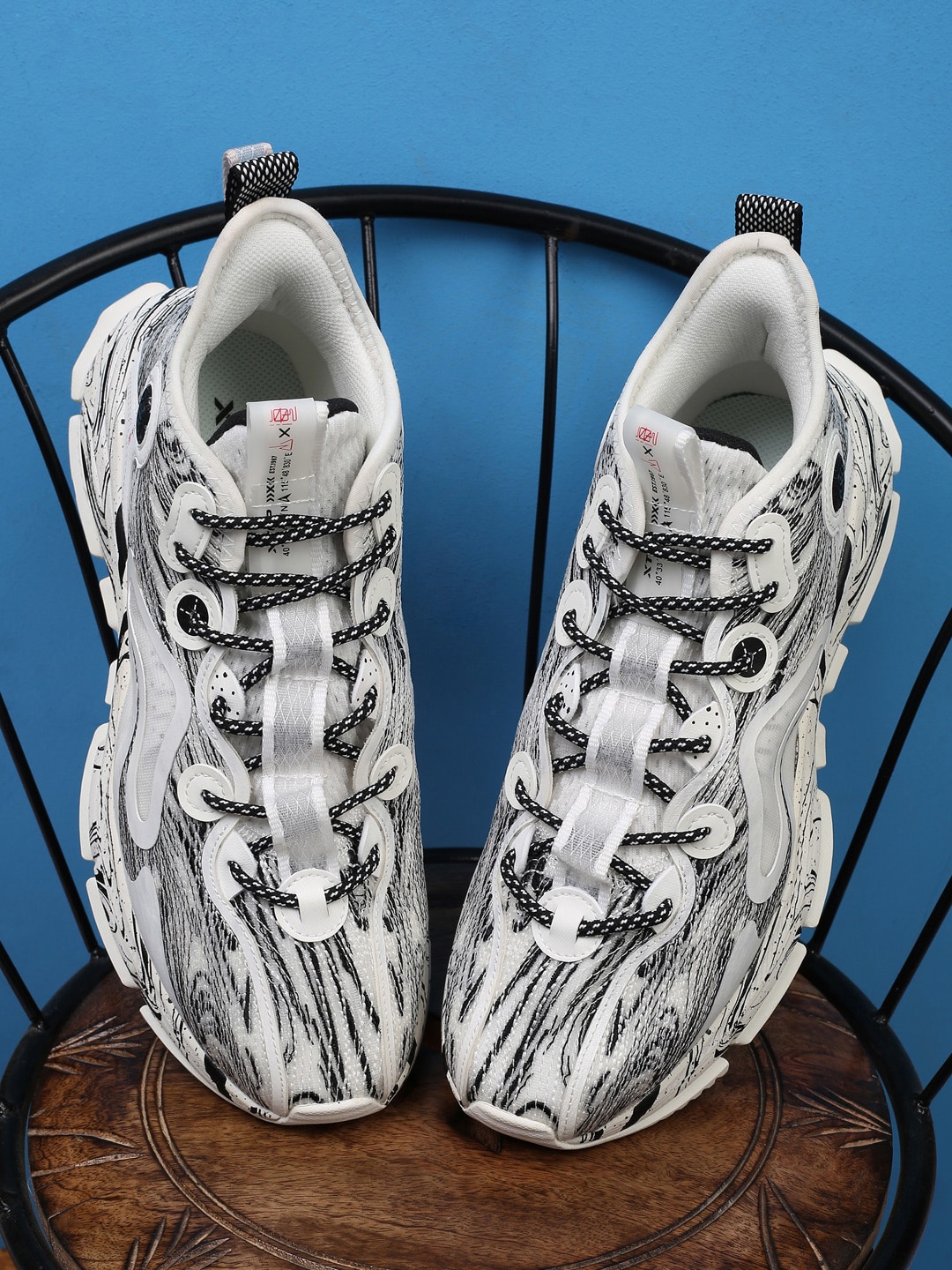 

Xtep Men White Printed Sneakers