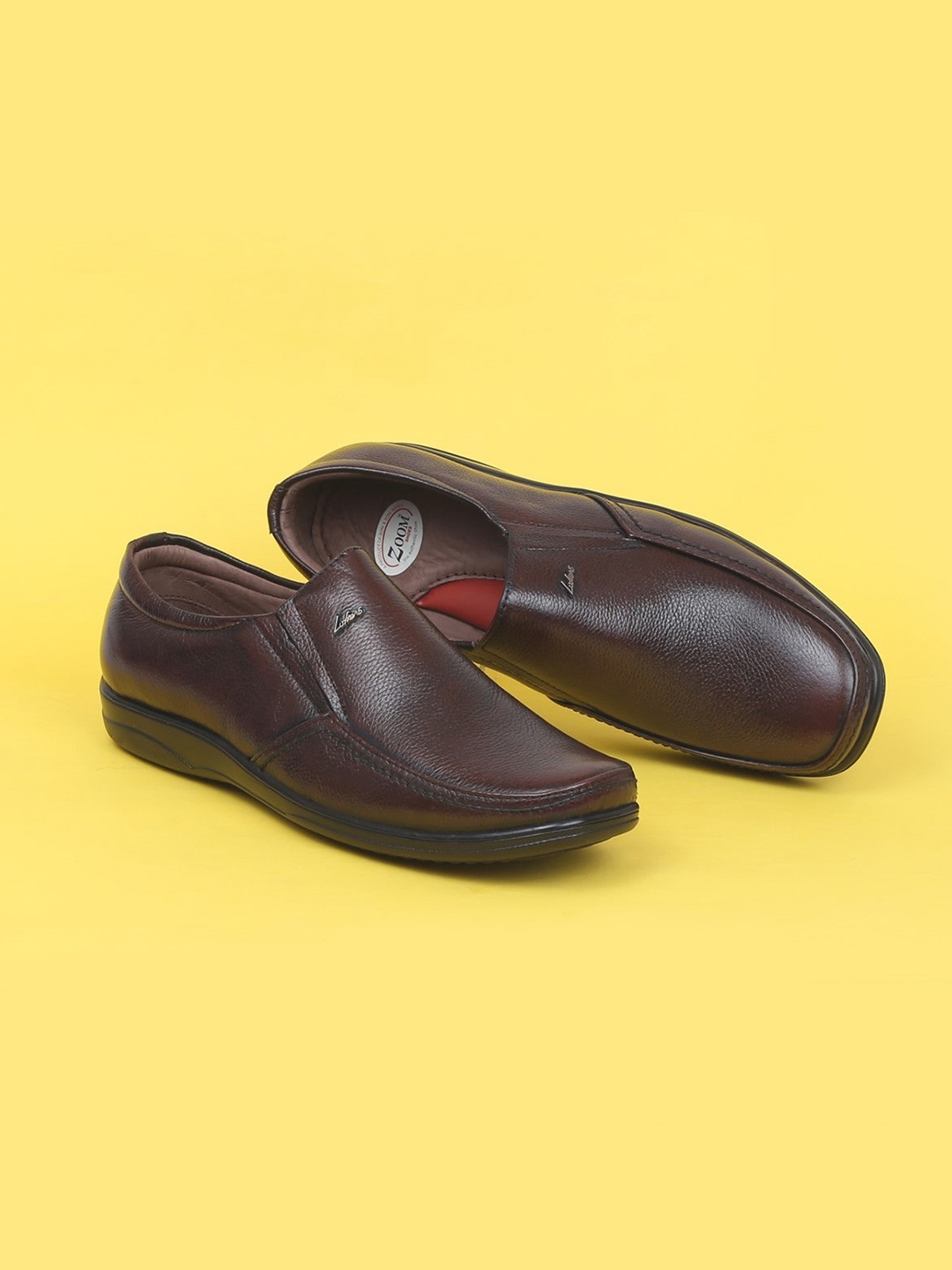 

Zoom Shoes Men Brown Solid Leather Formal Slip-On Shoes