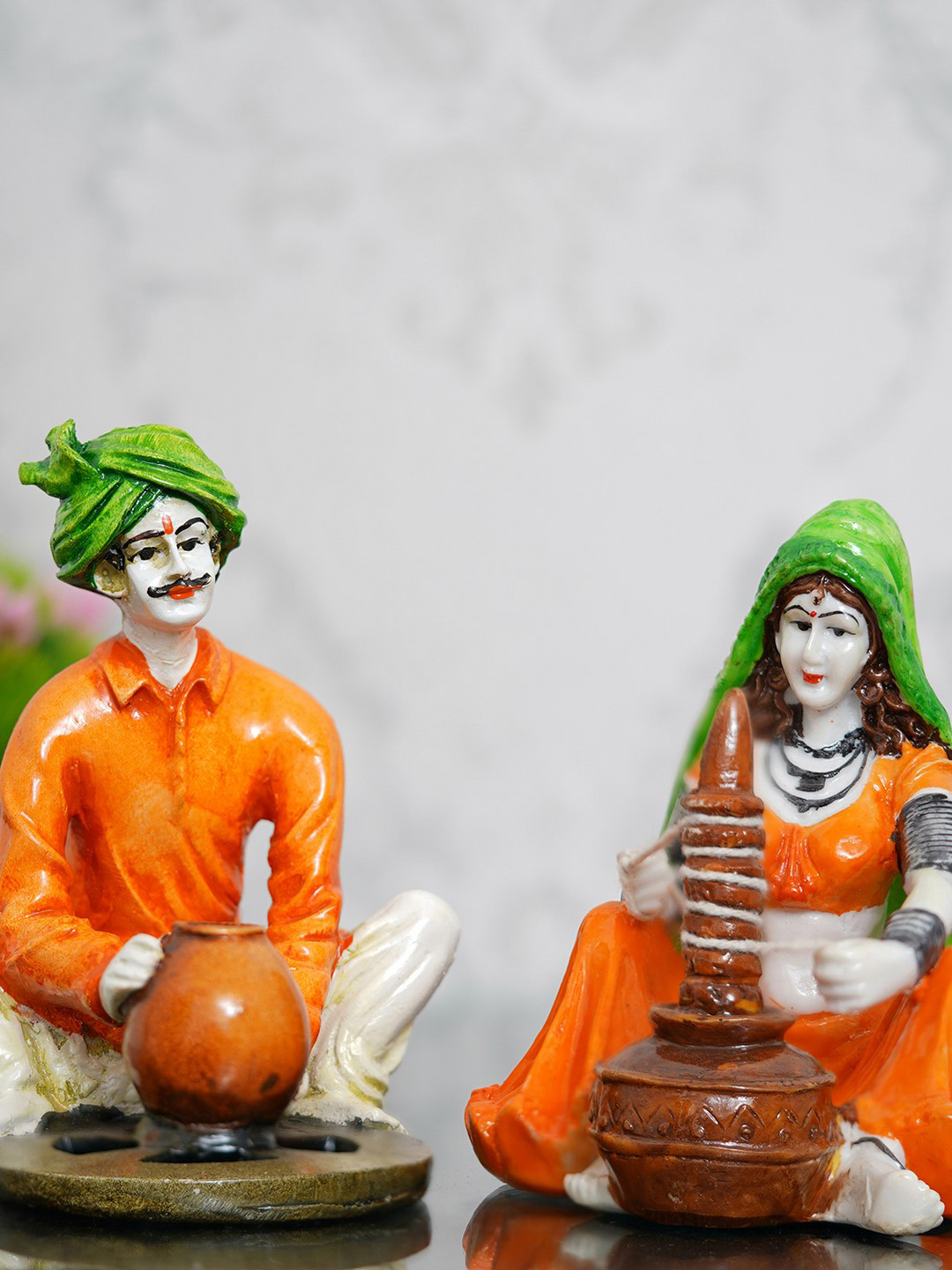 

eCraftIndia Set of 2 Orange & Off-White Handcrafted Rajasthani Figurines