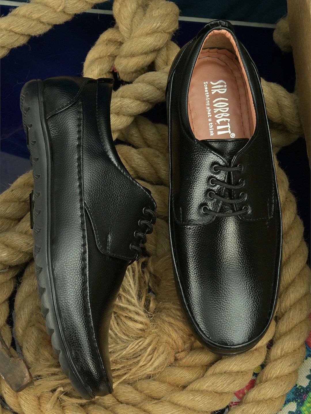 

Sir Corbett Men Black Solid Formal Shoes