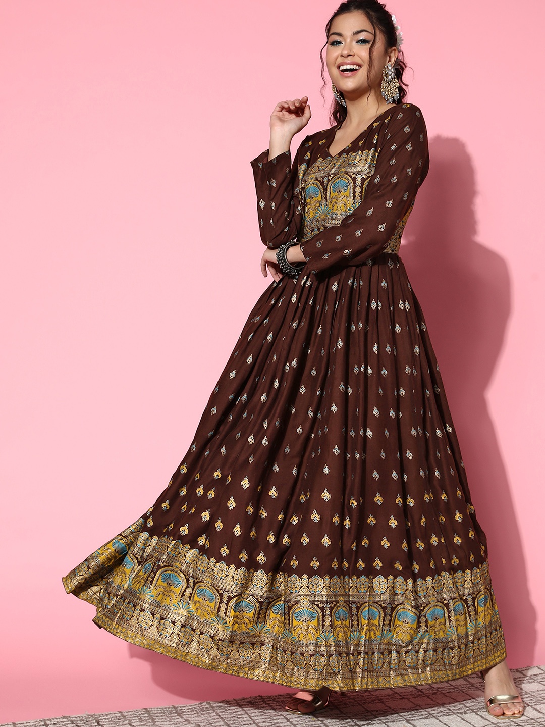 

InWeave Women Brown Viscose Rayon Volume Control Kurta