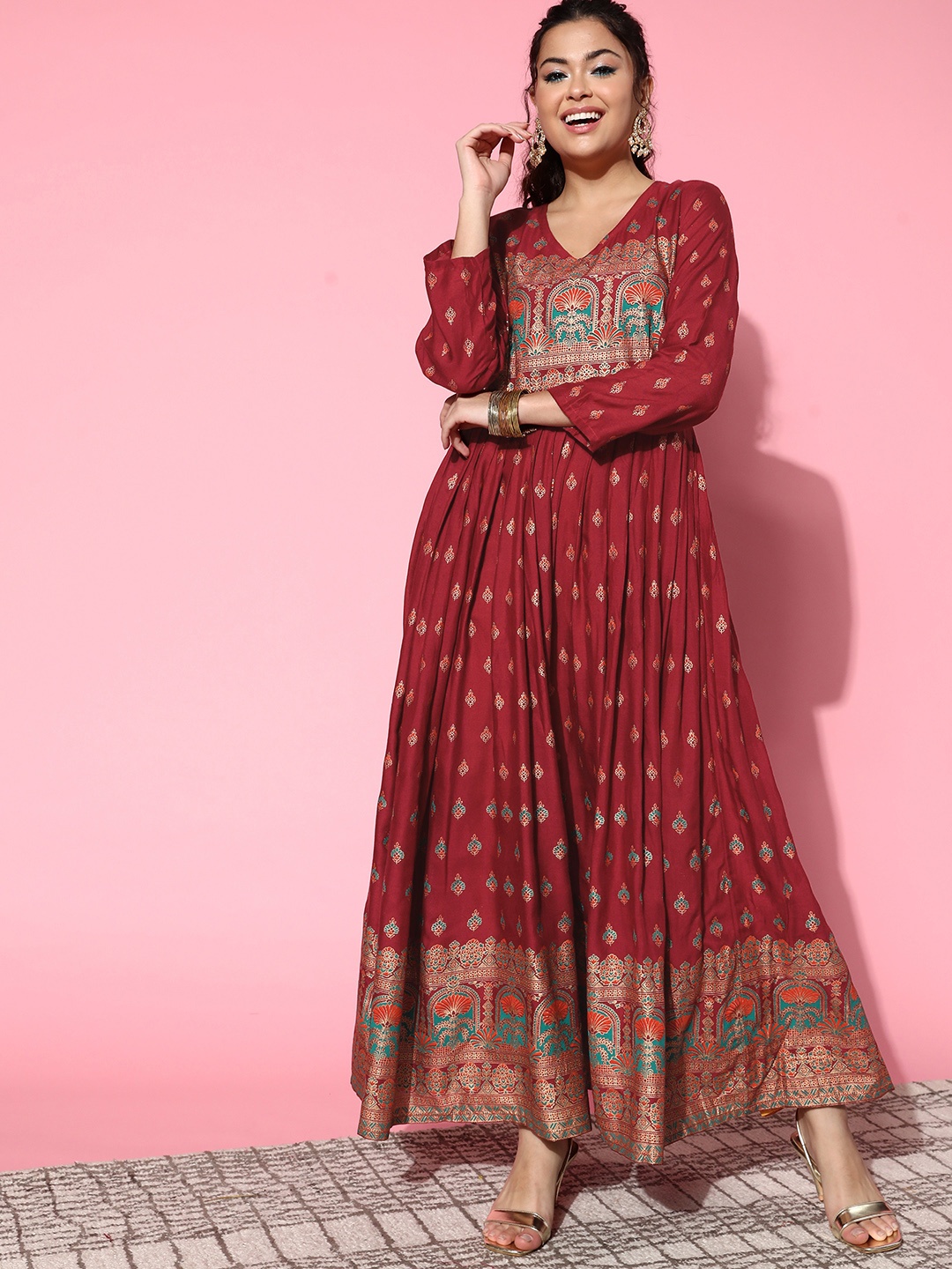 

InWeave Women Maroon Viscose Rayon Volume Control Kurta