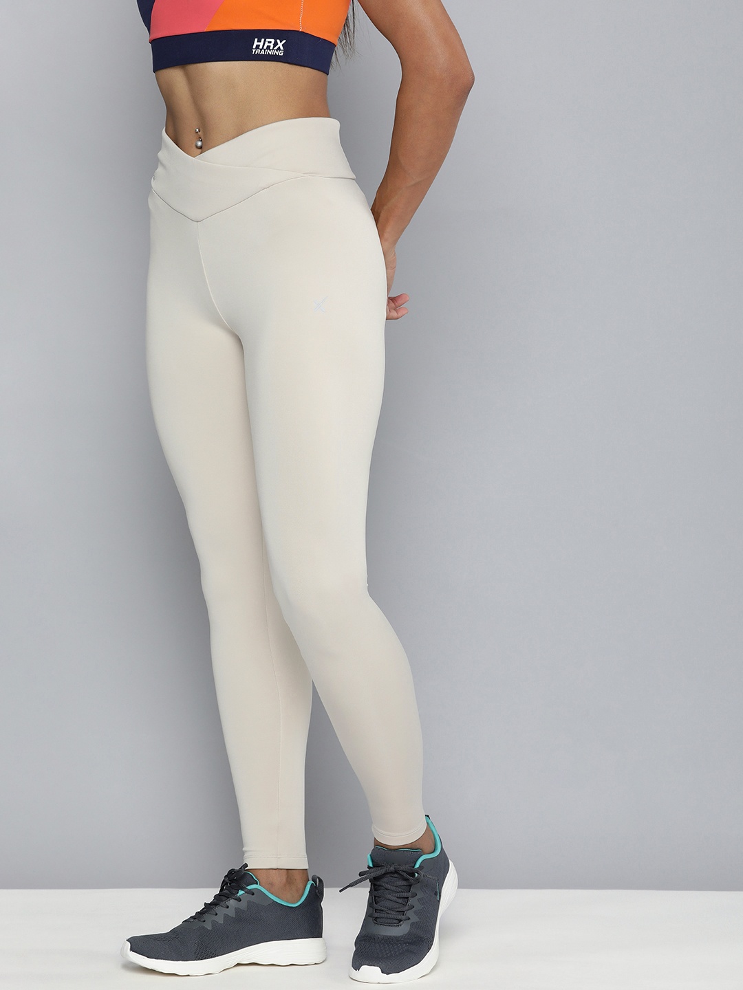 

HRX by Hrithik Roshan Women Beige Solid Rapid-Dry Running Tights