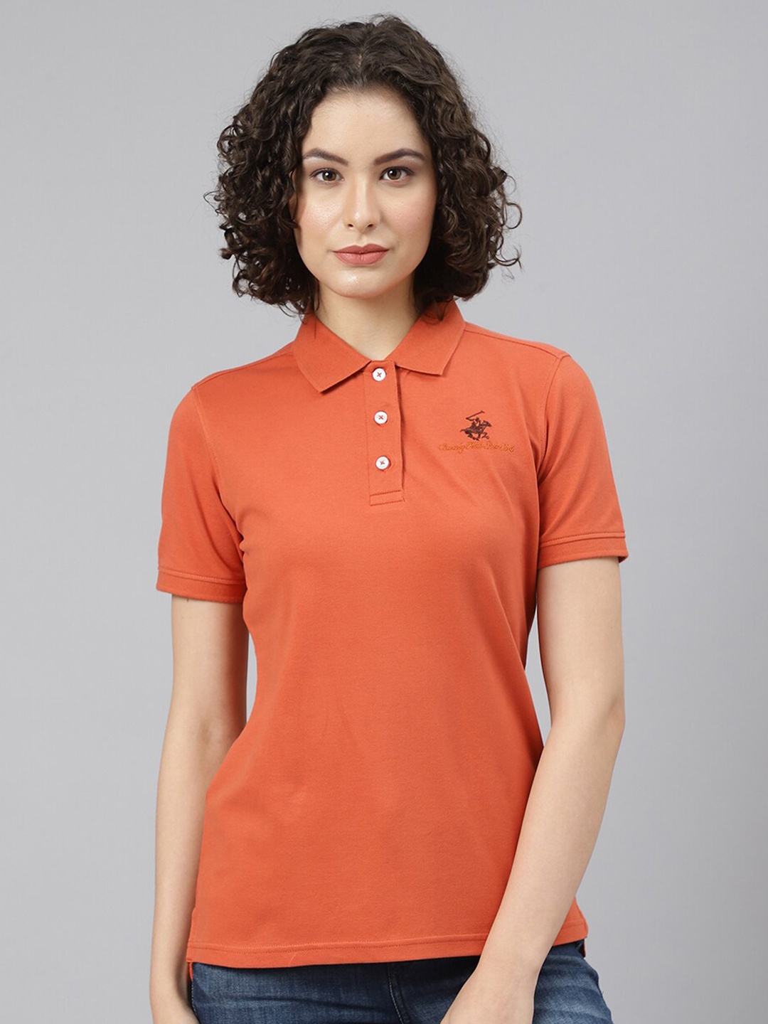 

Beverly Hills Polo Club Women Orange Solid Cotton Polo Collar T-shirt