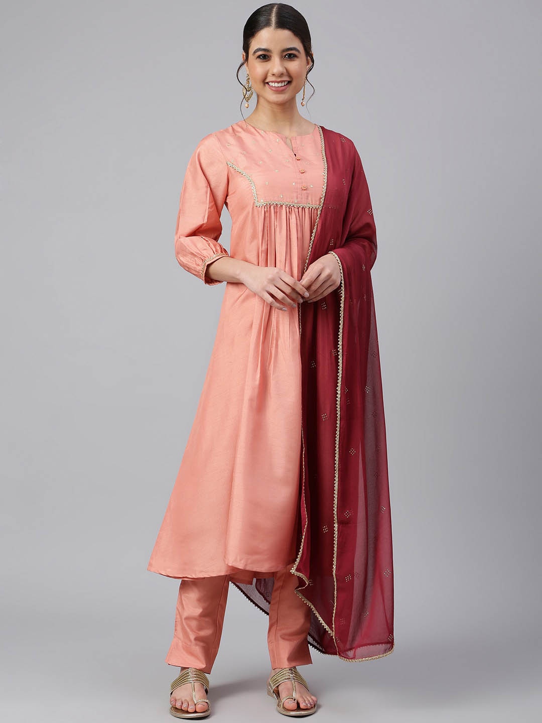 

Janasya Women Peach-Coloured Pleated Kurta with Trousers & Dupatta