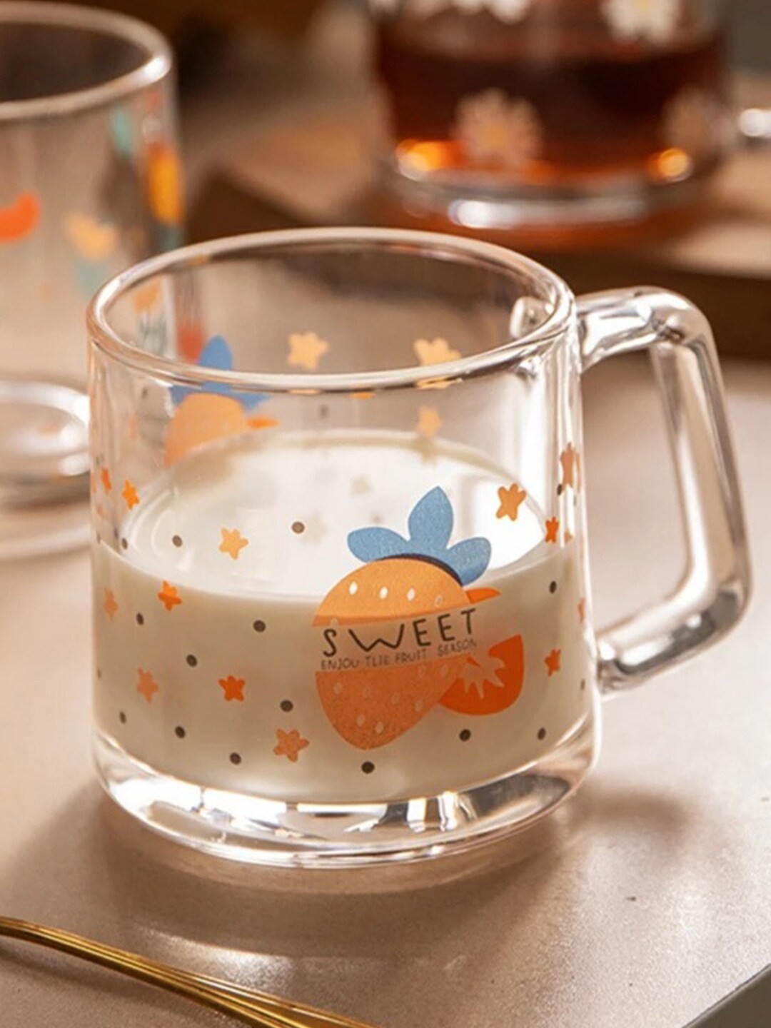 

MARKET99 Transparent And Orange Printed Dishwasher And Microwave Safe Glass Mug 350 ml