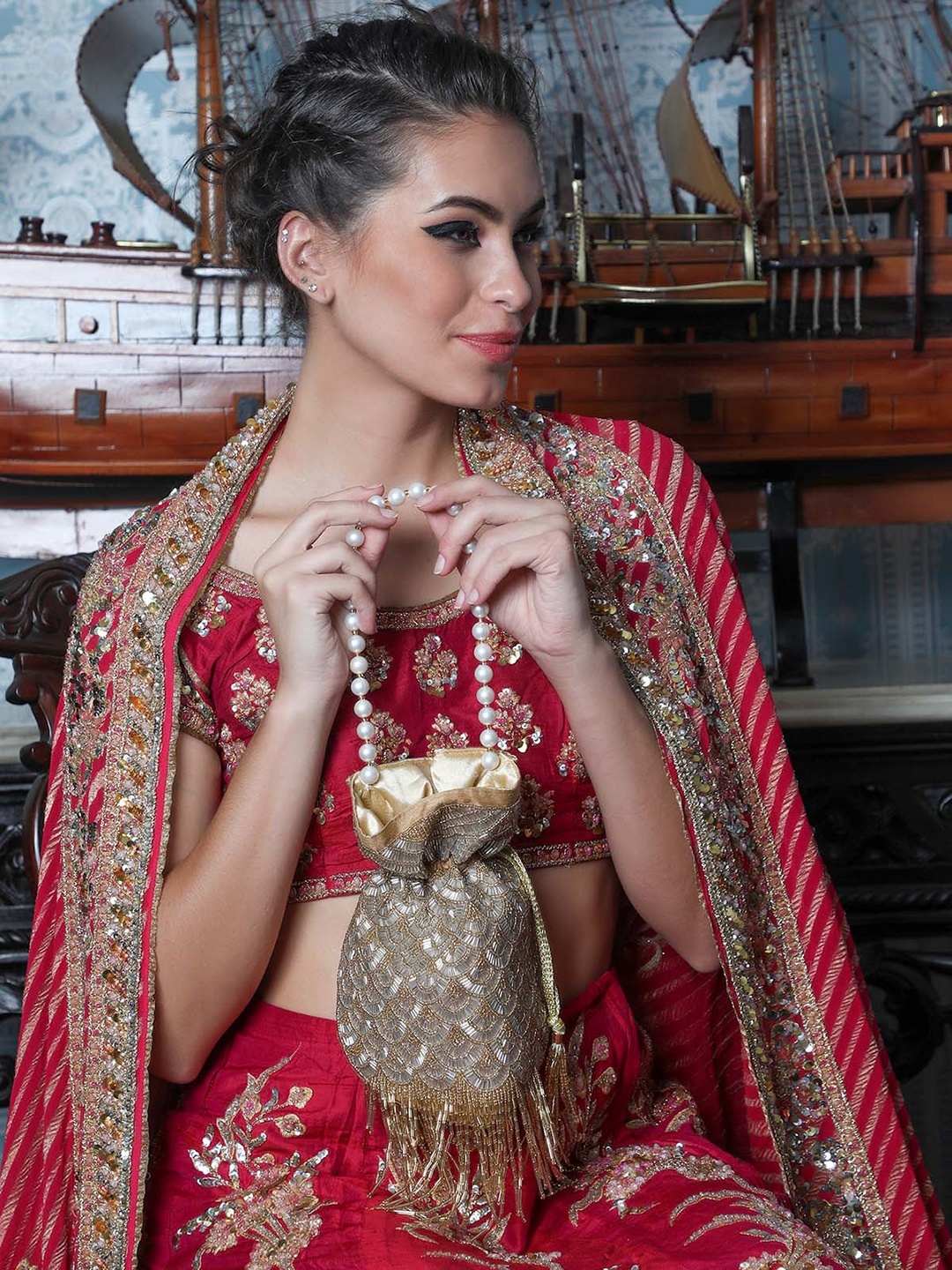 

ODETTE Women Gold-Toned Embellished Embellished Potli