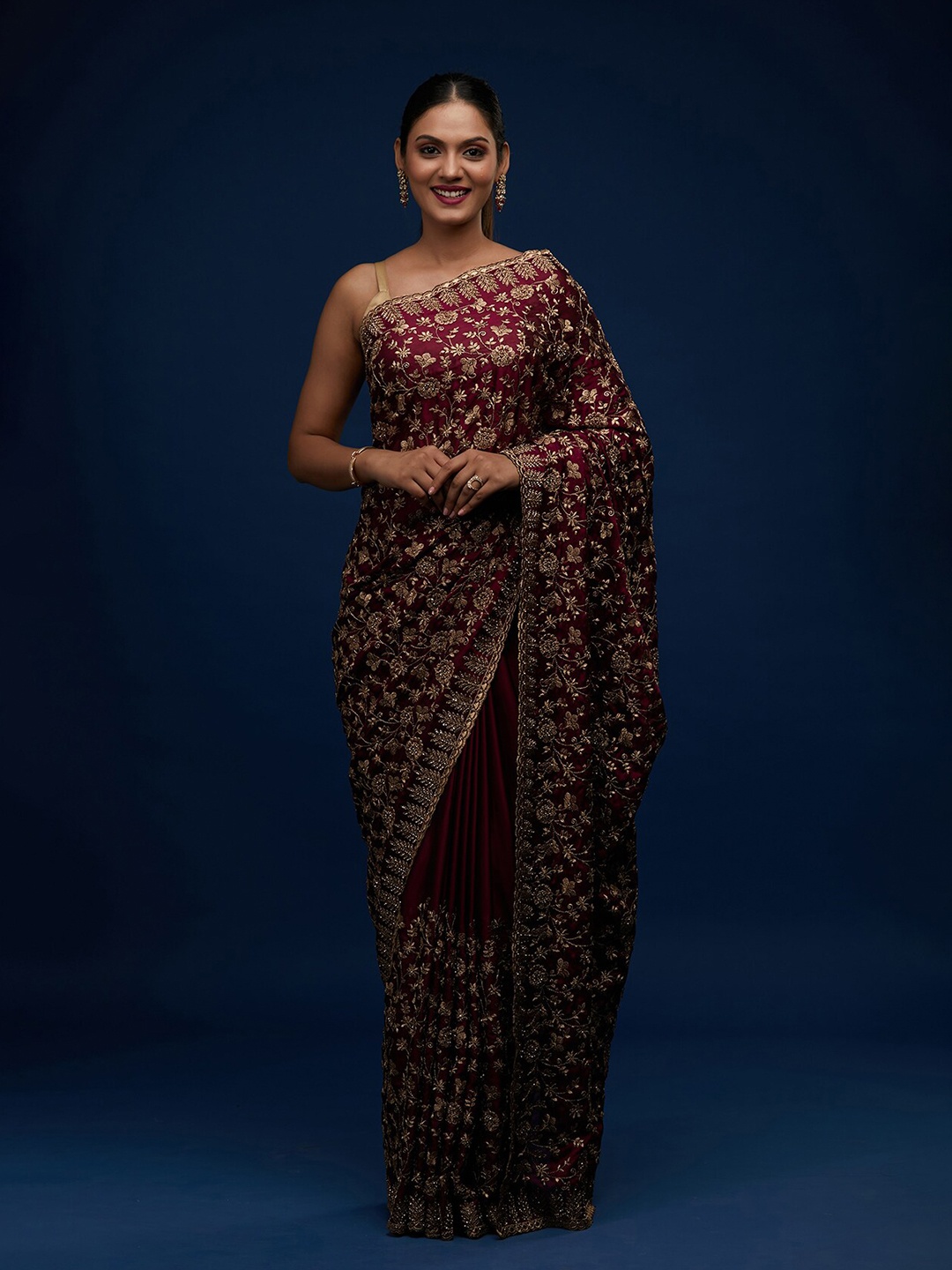 

Koskii Maroon & Gold-Toned Embellished Embroidered Saree