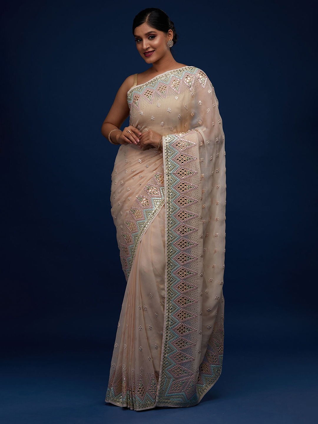 

Koskii Peach-Coloured & Silver-Toned Embellished Mirror Work Saree
