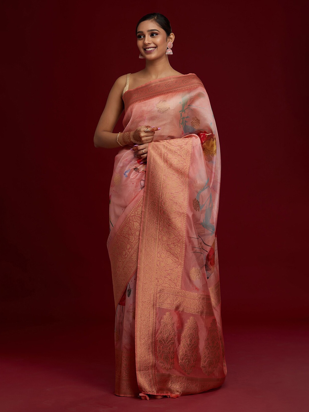 

Koskii Peach-Coloured & Gold-Toned Floral Zari Art Silk Saree