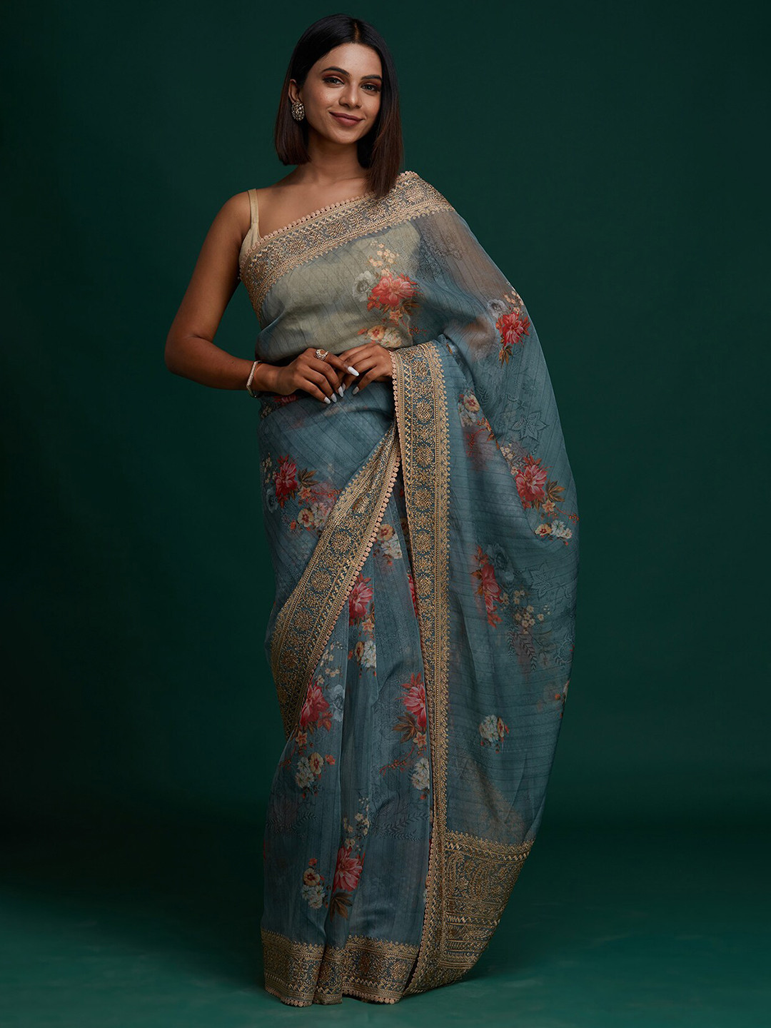 

Koskii Green & Cream-Coloured Embellished Beads and Stones Art Silk Saree