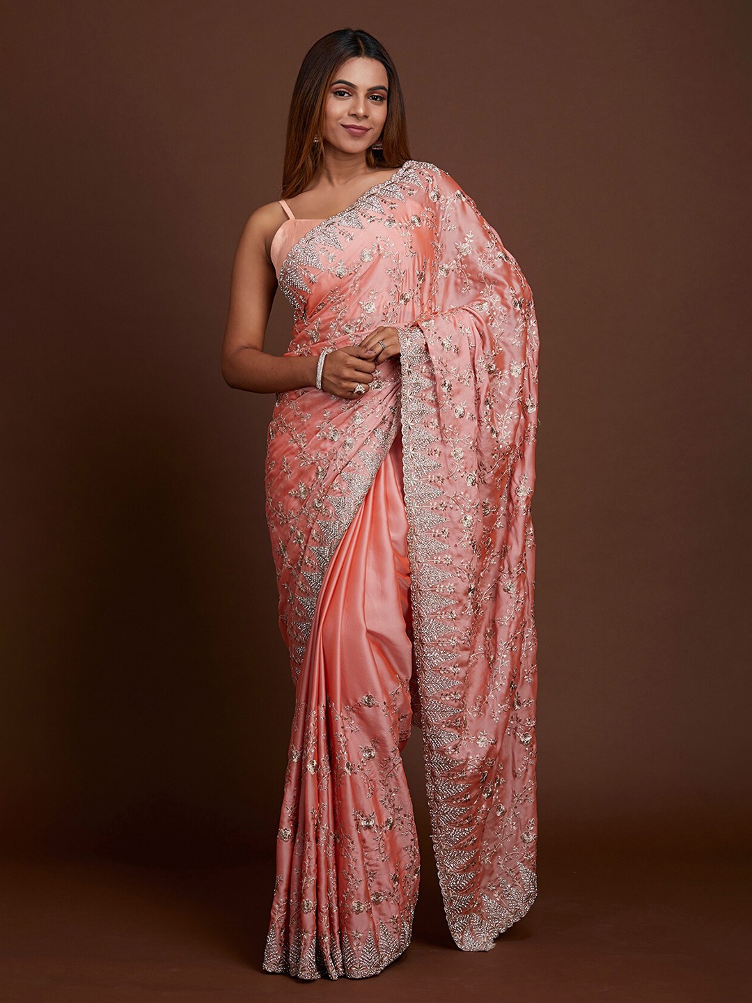 

Koskii Pink & Off White Embellished Beads and Stones Saree