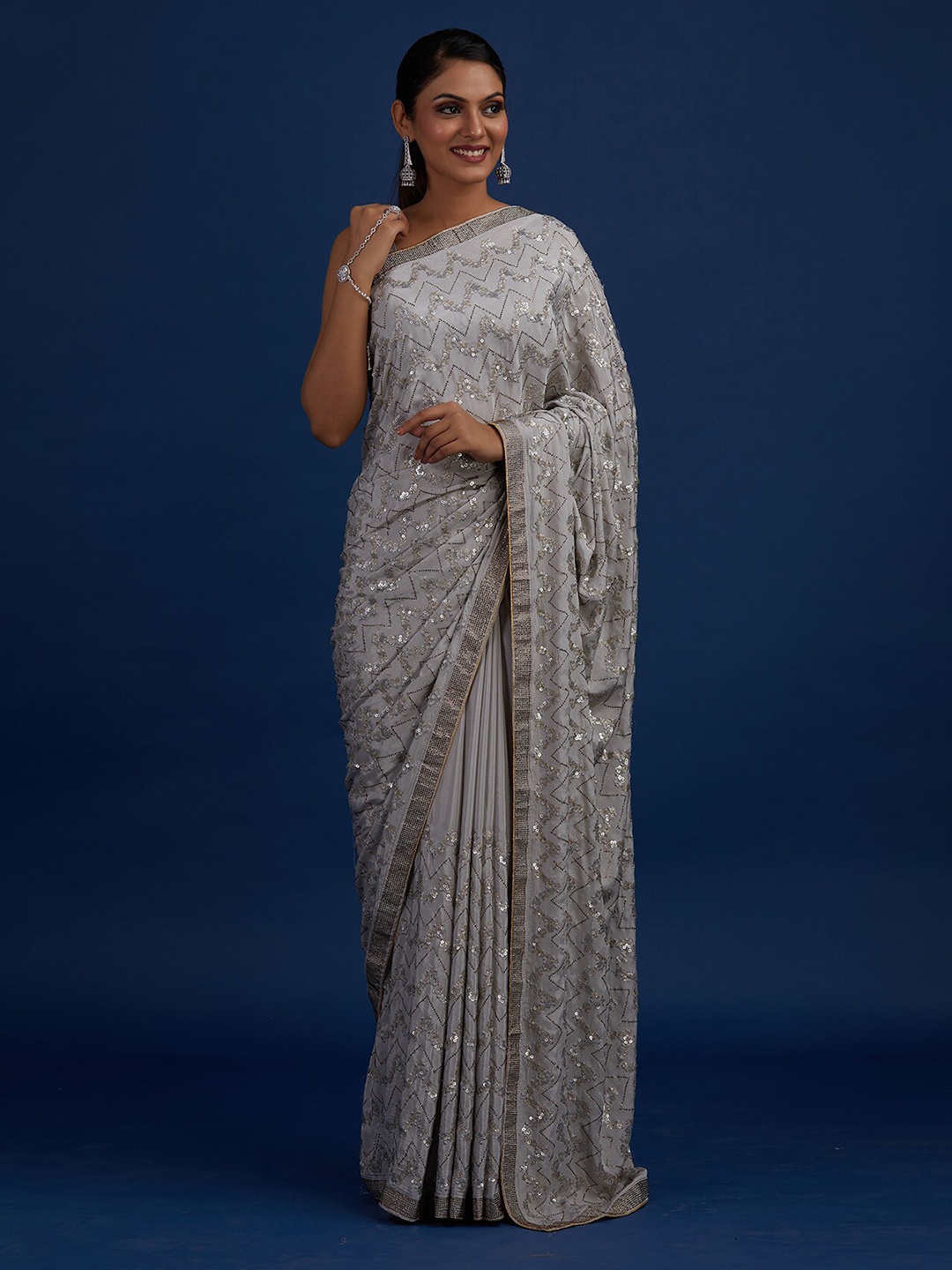 

Koskii Grey & Silver-Toned Embellished Beads and Stones Saree