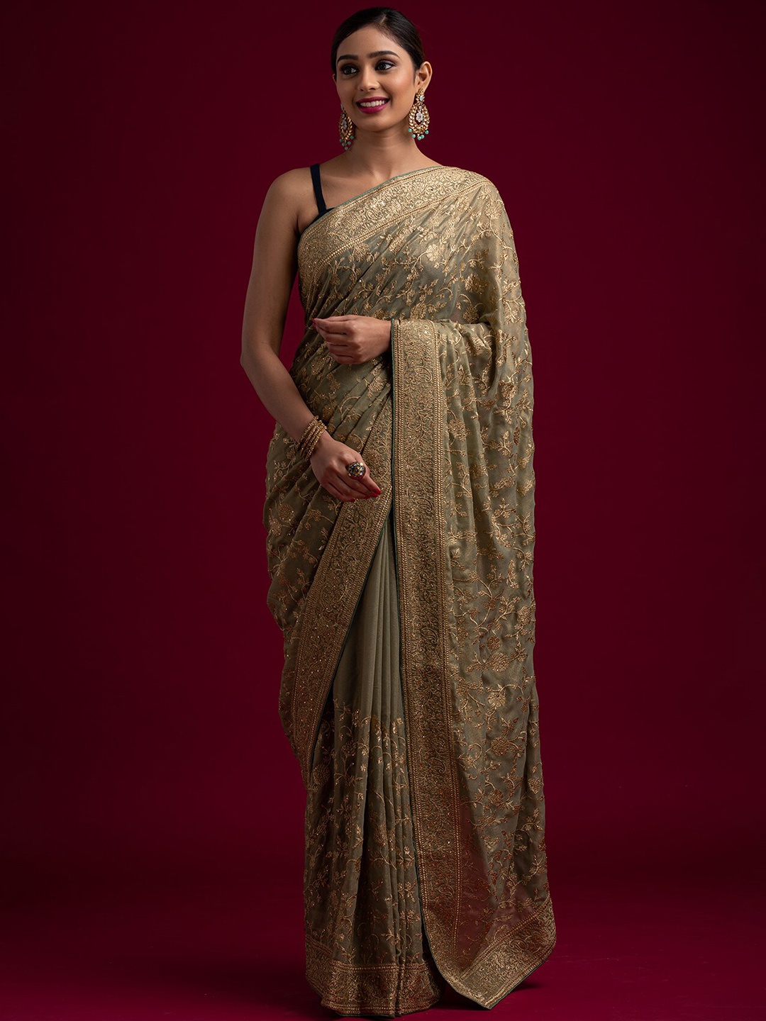 

Koskii Green Embellished Beads and Stones Saree