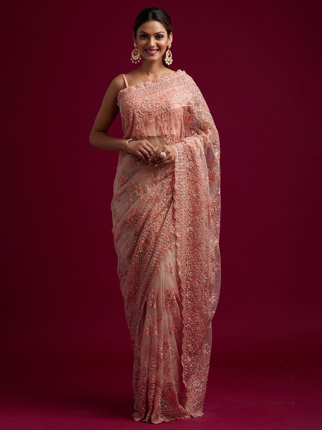 

Koskii Peach-Coloured & Gold-Toned Embellished Beads and Stones Supernet Saree