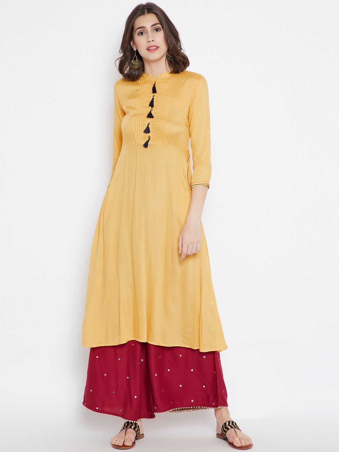 

Be Indi Women Yellow Solid Kurta