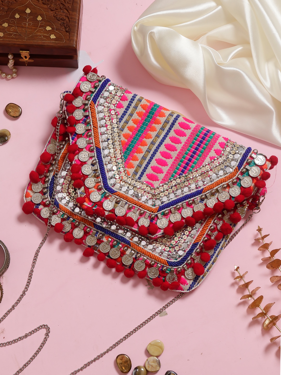 

Swisni Women Pink Embroidered And Embellished Clutches