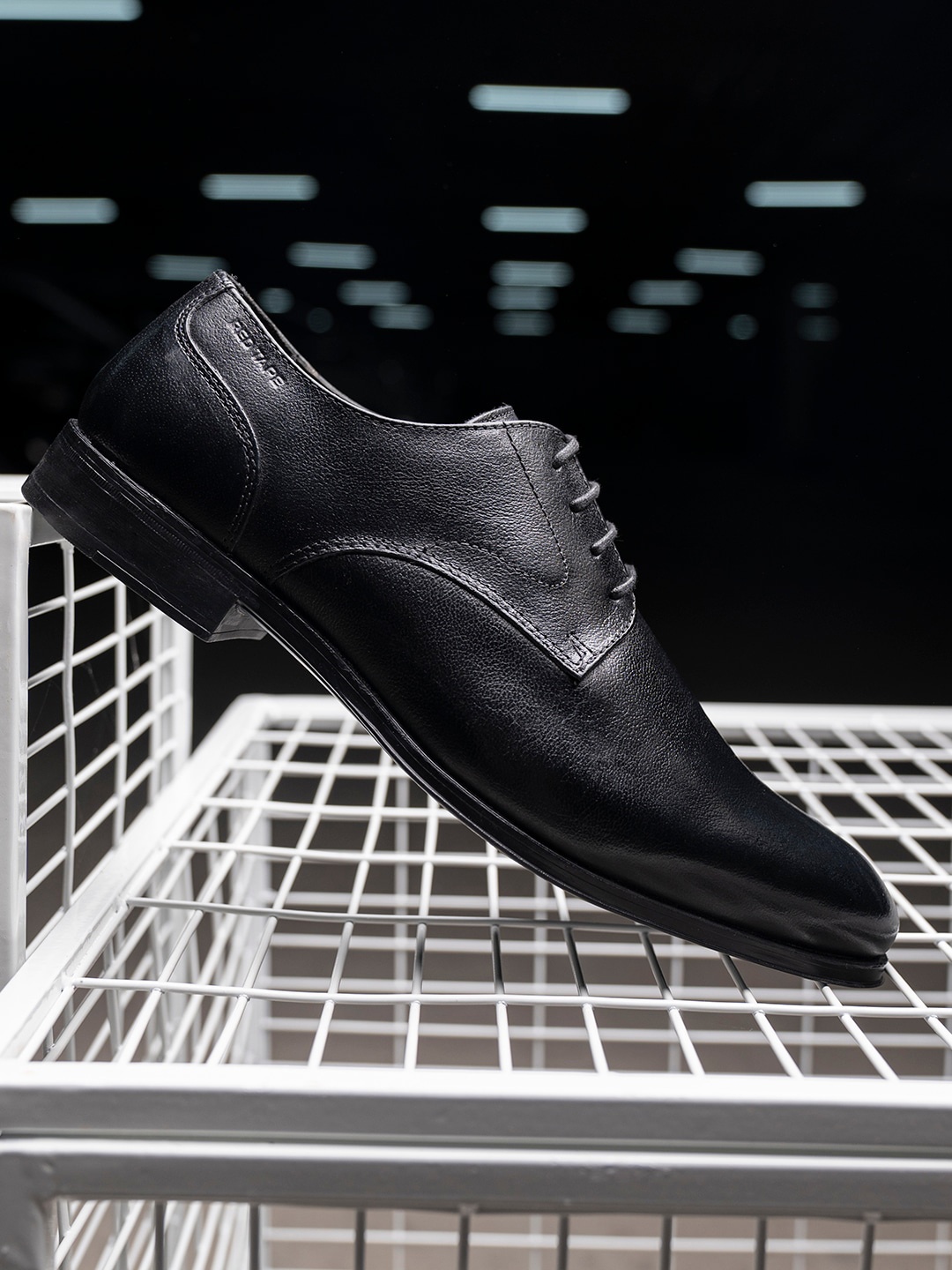 

Red Tape Men Black Solid Leather Formal Derbys