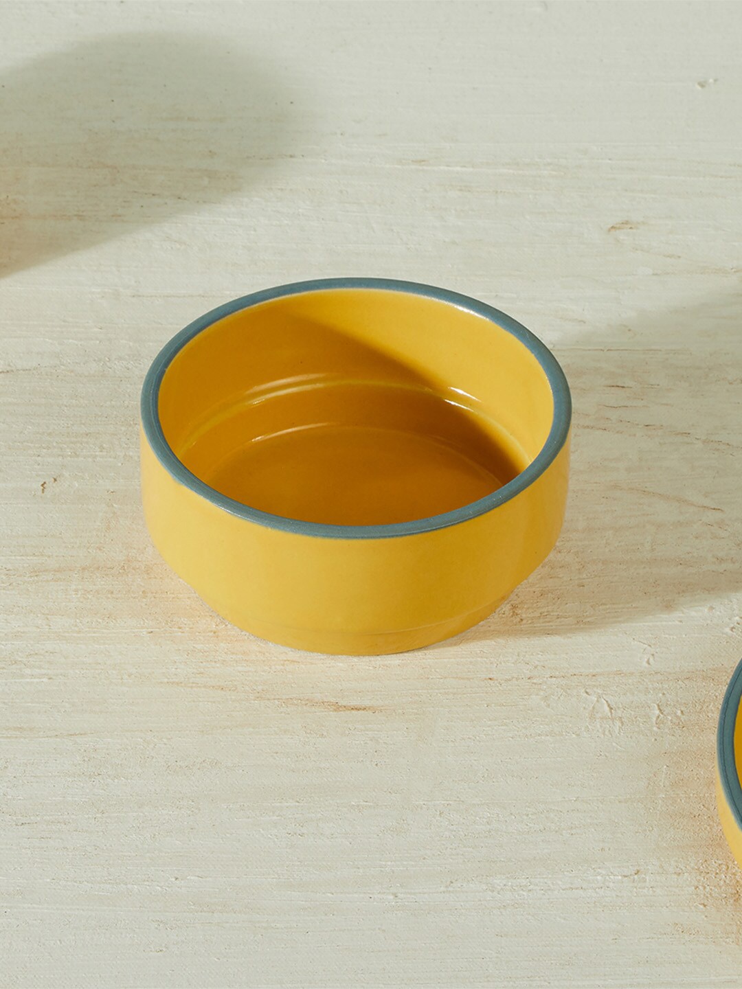 

Fabindia Yellow & Blue Solid Ceramic Glossy Bowls