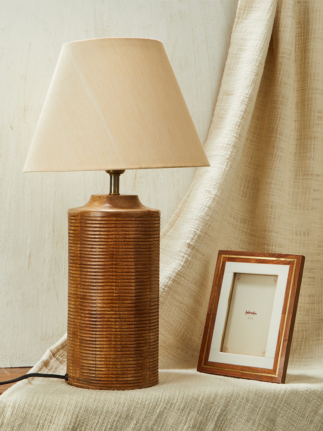 

Fabindia Beige Solid Wood Table Lamps