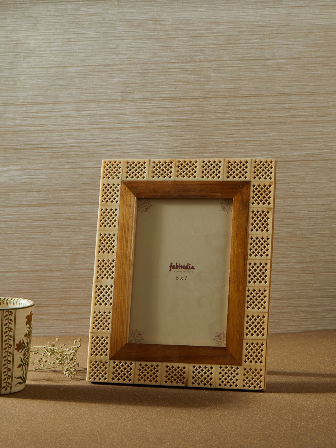 

Fabindia Brown Cutwork Textured Photo Frames