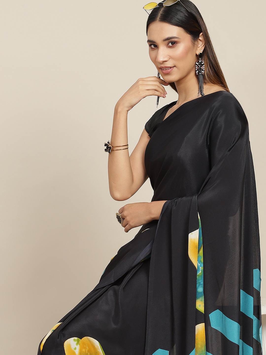 

Tikhi Imli Black & Blue Printed Saree