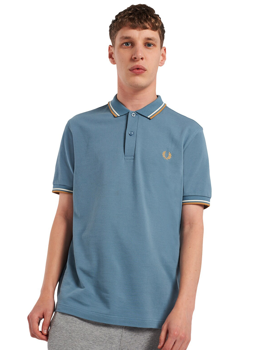 

Fred Perry Men Blue Solid Polo Collar T-shirt