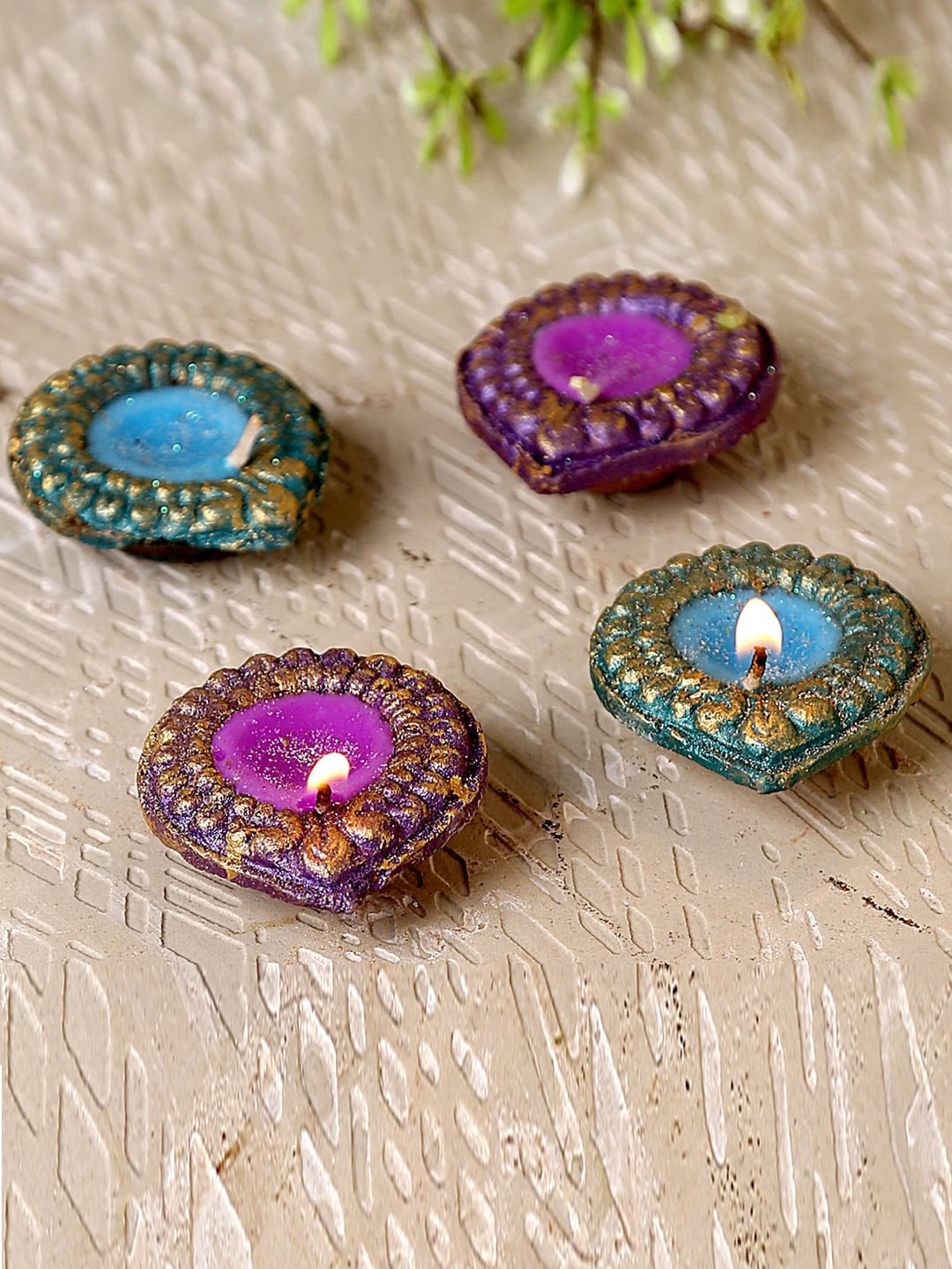 

Aapno Rajasthan Pack Of 4 Wax Filled Terracotta Diya, Blue