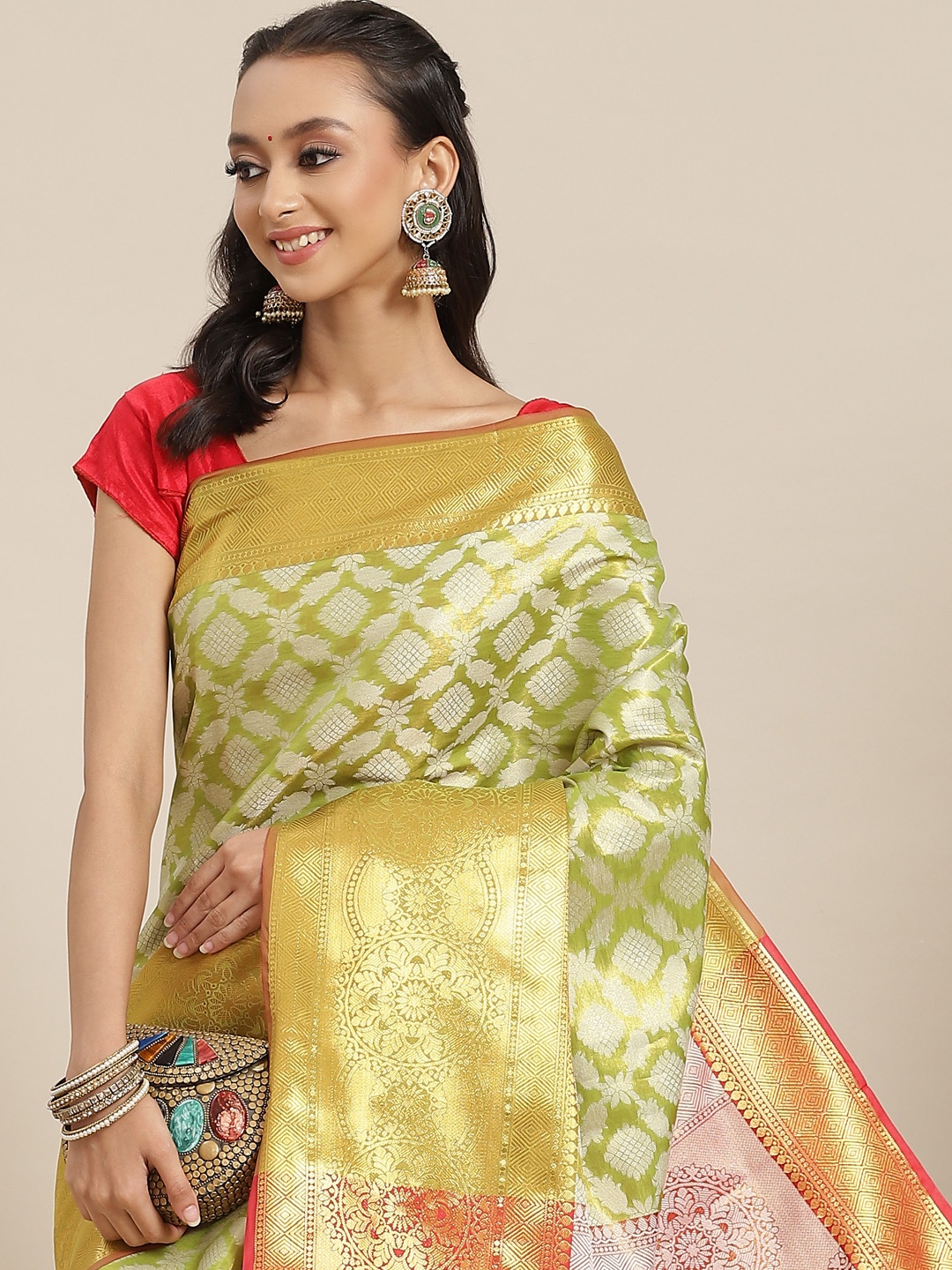 

Silk Land Lime Green & Orange Ethnic Motifs Zari Brocade Banarasi Saree