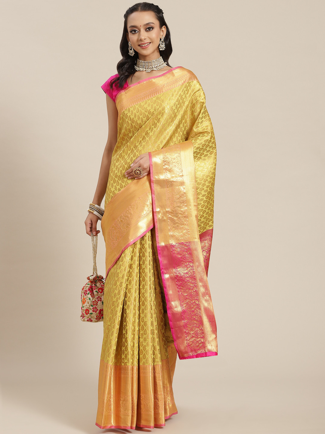 

Silk Land Yellow & Pink Ethnic Motifs Zari Brocade Banarasi Saree