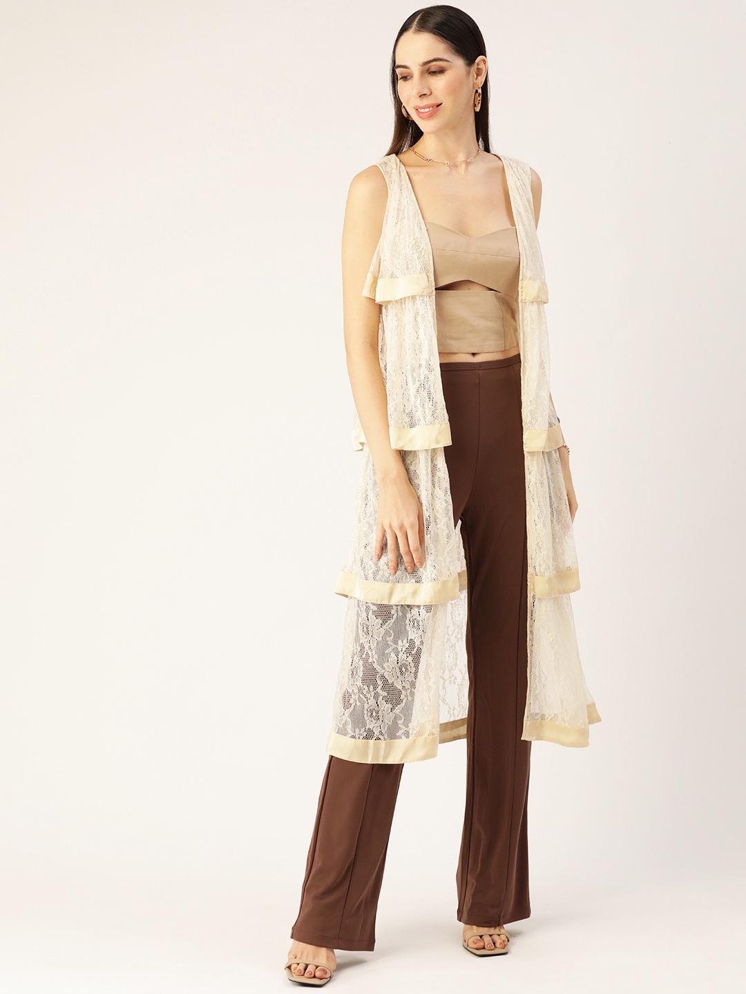 

Antheaa Women Cream-Coloured Self Design Longline Shrug