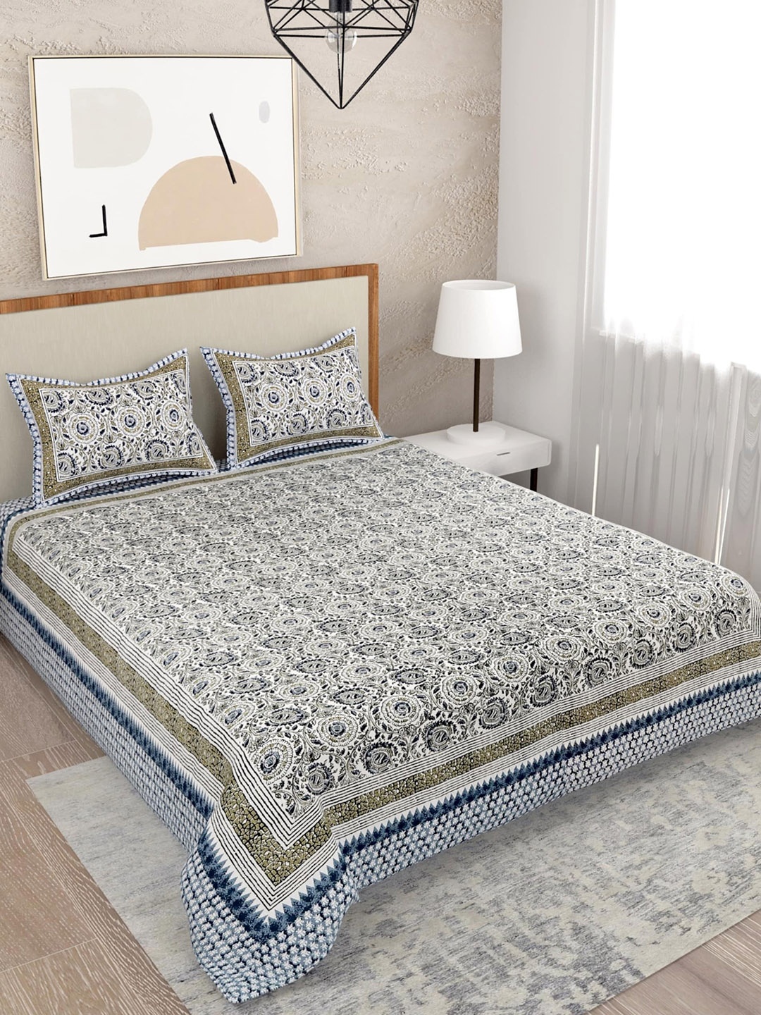 

Salona Bichona Blue & Off White Floral 120 TC Cotton Queen Bedsheet with 2 Pillow Covers