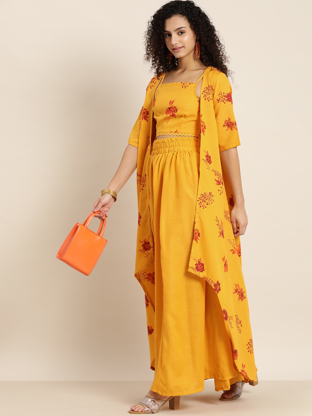 

Moda Rapido Women Mustard & Red Printed Top with Skirt With Shrug