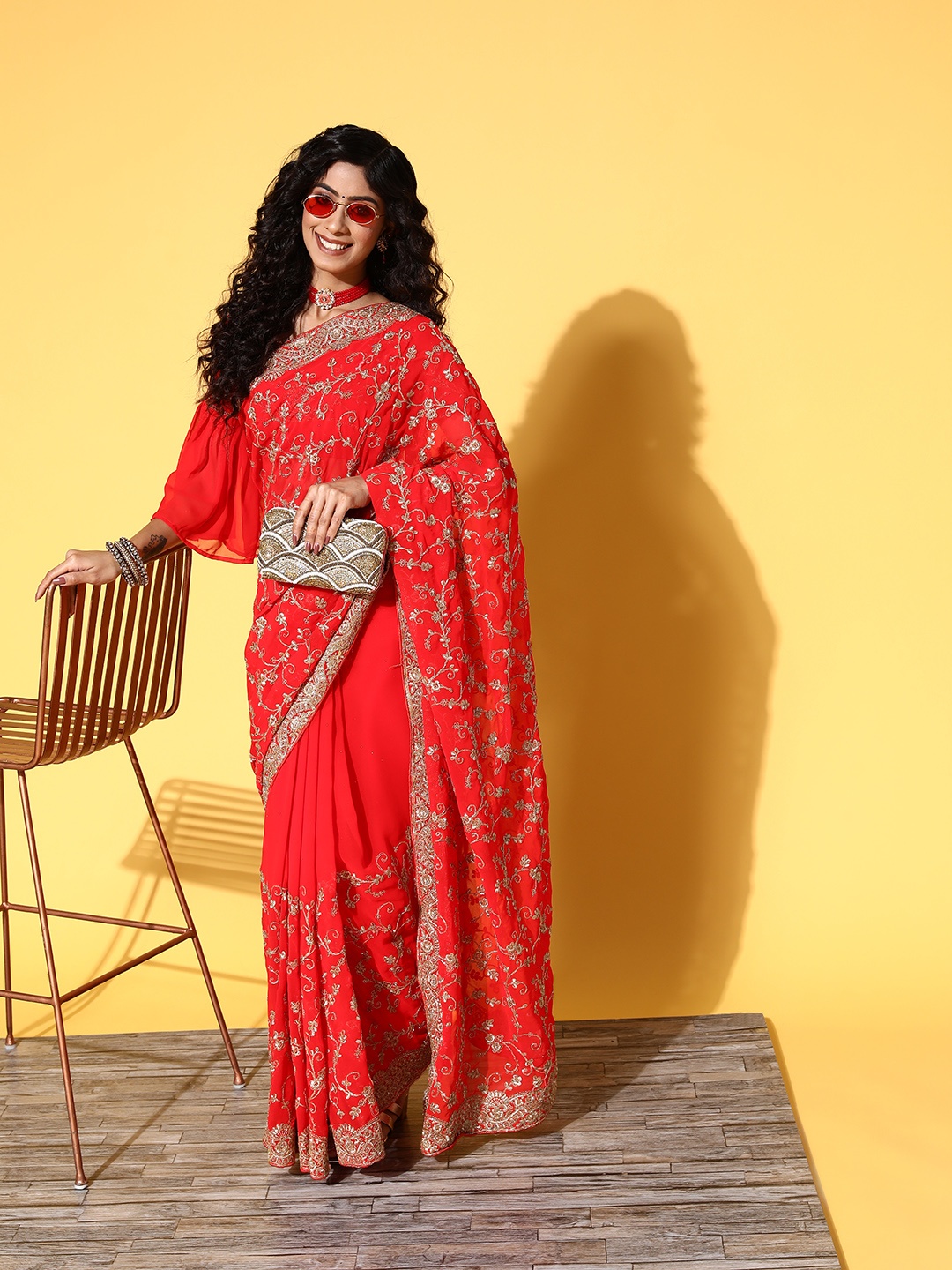 

Tikhi Imli Red & Gold-Toned Floral Zari Saree