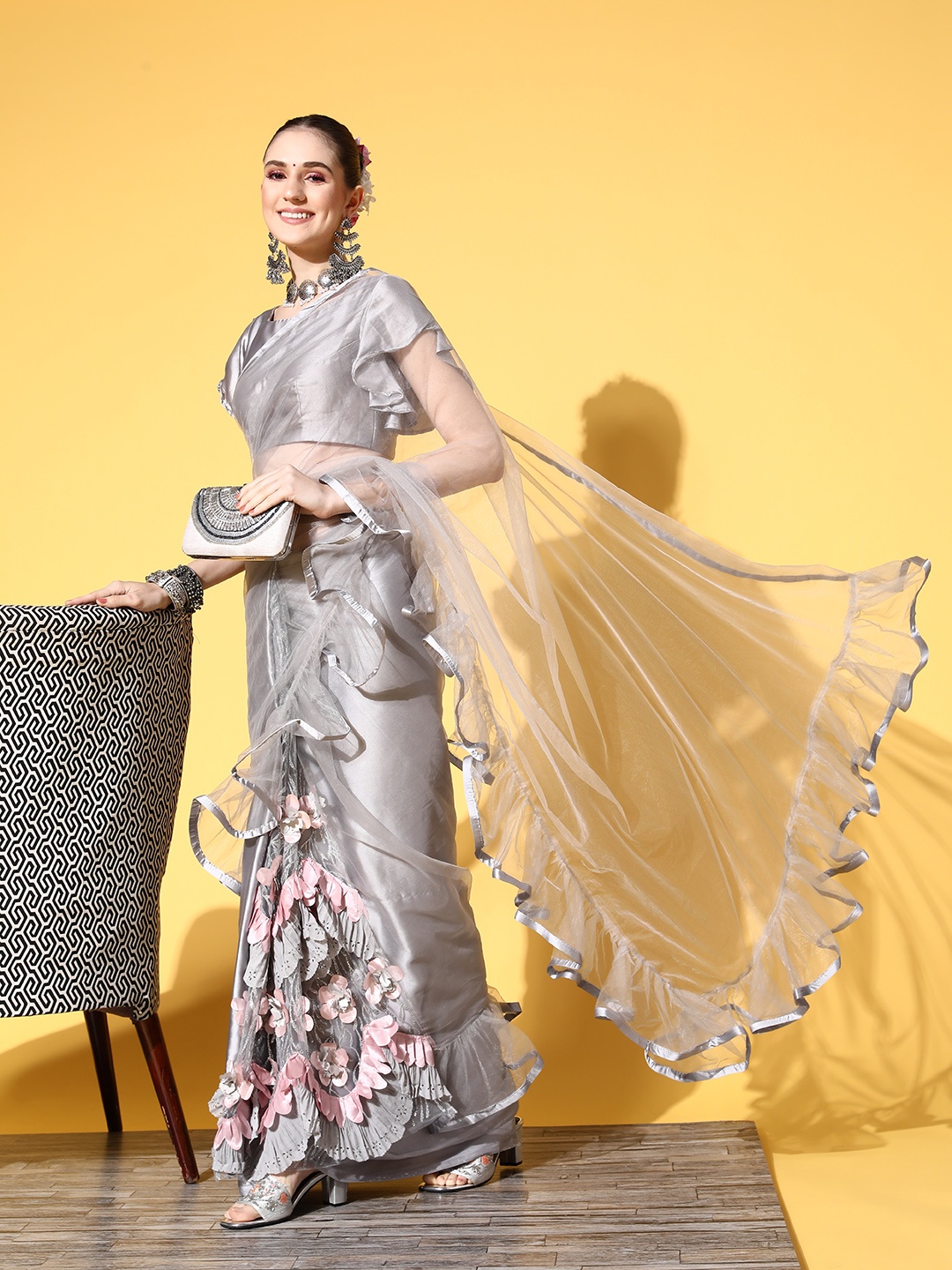 

Tikhi Imli Grey Sequinned Net Saree