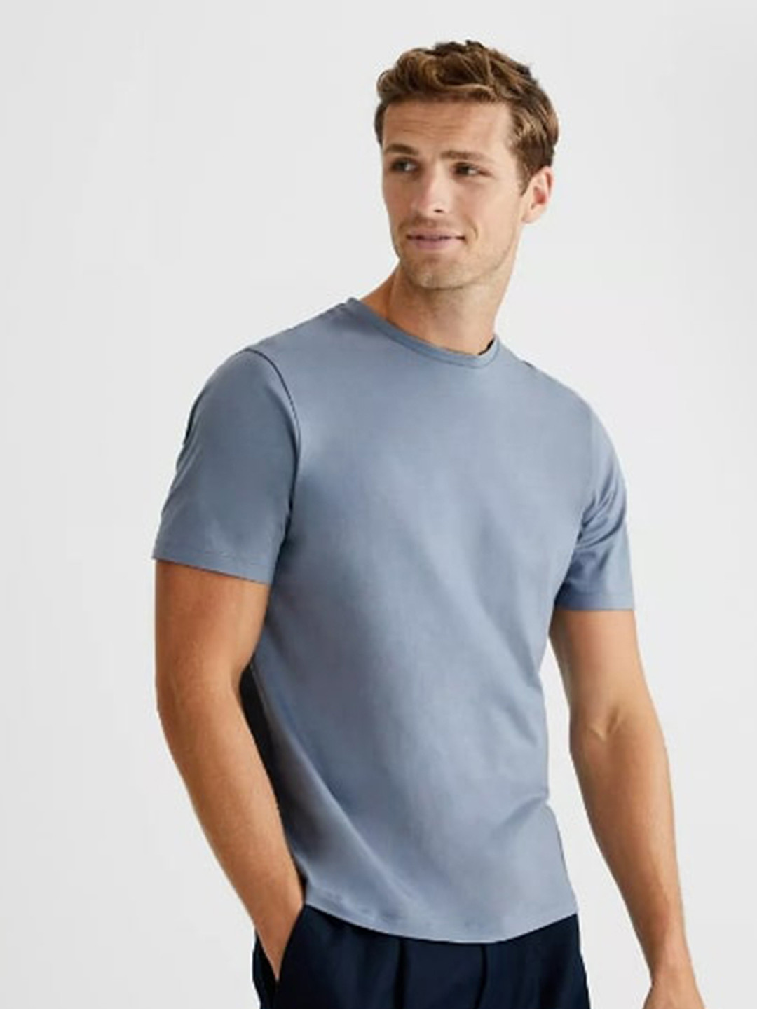 

Marks & Spencer Men Blue Solid Cotton T-shirt