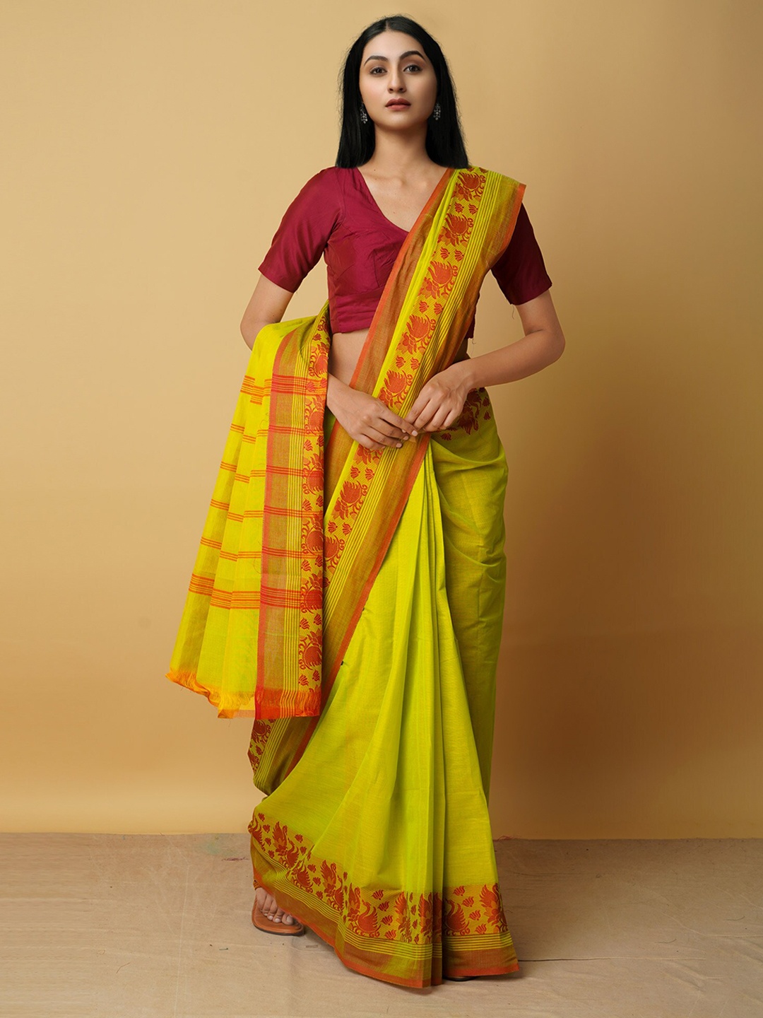

Unnati Silks Green & Red Floral Pure Cotton Kanjeevaram Saree